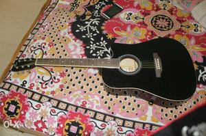 I had buyed dis Pluto acoustic guitar jumbo size