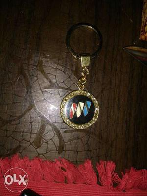 Round Black-and-gold-colored Keychain
