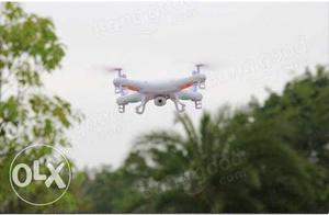 White And Red Drone Quadcopter