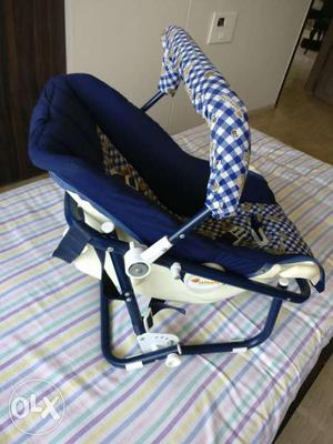 Baby's Blue And White Car Seat Carrier