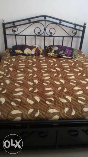 Iron double bed with mattress hardly used for 8