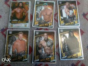 Six WWE Collectible Cards