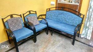 Teal Loveseat And Armchairs