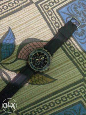 Black-faced Chronograph Watch With Black Strap