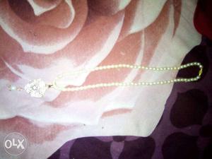 Golden locket necklace