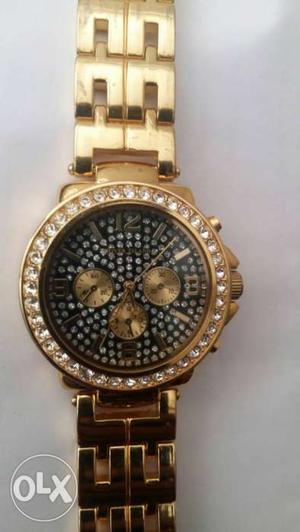 Men gold coloured watch very good working