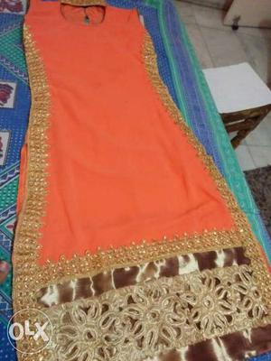 Orange suit with churidar and dupatta long party