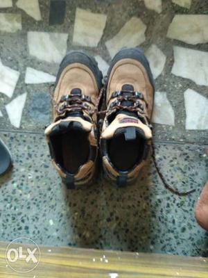 Pair Of Brown And Black Hiking Boots