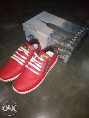 Pair Of Red And White Low Top Sneakers And Westcode Box