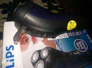 Two Black Philips Cordless Shaver On Box