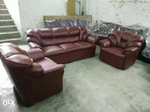 Attractive cherry coloured five seater sofa set
