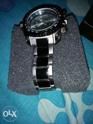 Black And Silver Round Framed Chronograph Watch With Link