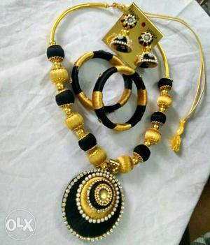 Black-and-yellow Jhumka Earrings, Bracelets, And Necklace