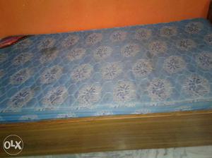 Blue Floral Quilted Mattress with bed