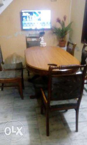 Gently used Oval shaped wooden dining table