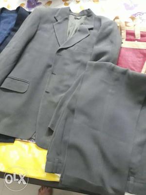 Grey branded suit, waist size 34