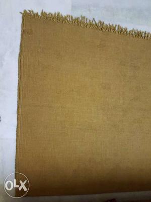 Jute carpet dark green color of 7ft by 6ft size