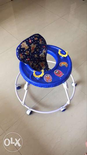 Kids walker in good confition, blue colour with