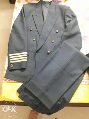 Navy Blue suit with waist size 34 and blazer.