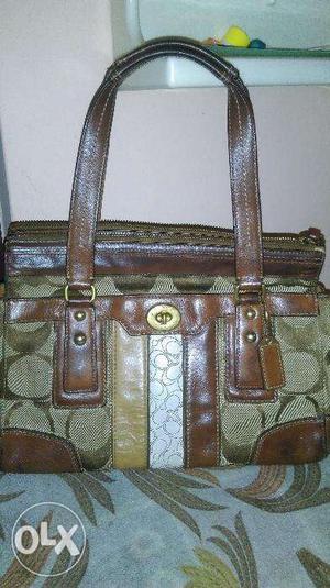 One time used 100% leather ladies handbag