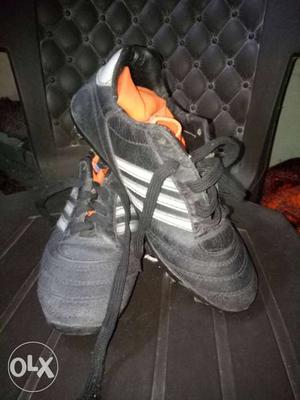 Pair Of Black Adidas Cleats