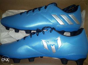 Pair Of Blue Adidas Cleats