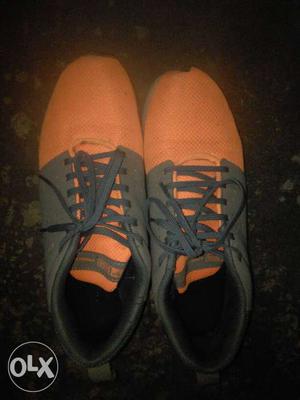 Pair Of Orange-and-gray Low Tops Sneakers