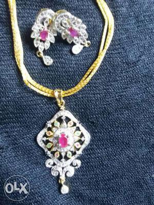 Pink And Silver Diamond Shaped Pendant Necklace