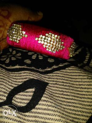 Pink coloured bangles with stone work perfect