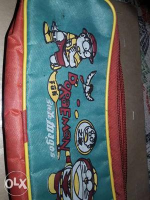 Red, Teal, And Yellow Doraemon Zip Case