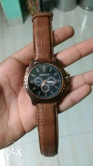 Round Black Chronograph Watch With Brown Band... At very