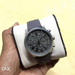 Round Gray Chronograph Watch With Leather Strap