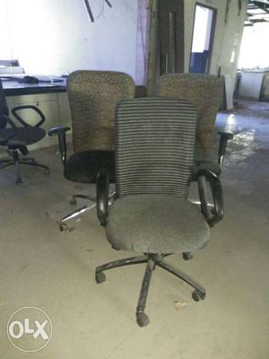 Three Black Suede Office Rolling Chairs