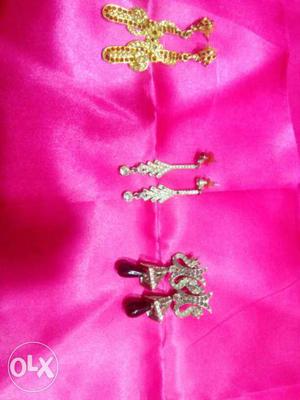 Three Pairs Of Rhinestone Embellished Drop Earrings