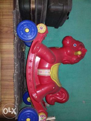 Toddler's Red Yellow And Blue Ride On Horse Toy