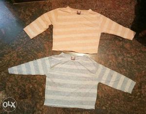 Two Striped Long--sleeve T-shirts. 150 each.