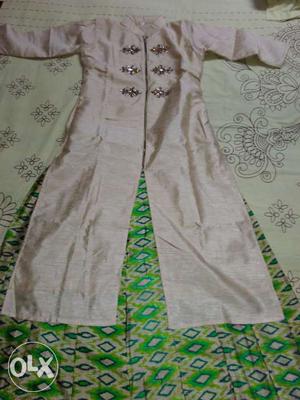 Unused Long kurti with long skirt (Not so glossy