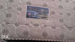 White And Black Floral Quilted spring Mattress in good