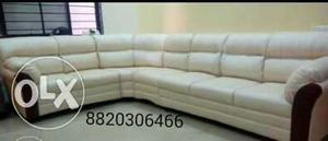 White leatherette sectional sofa