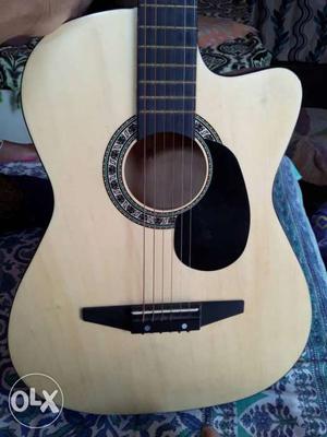 Beige Cutaway Acoustic Guitar