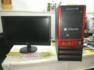 Black AOC Flat Screen Computer And Red-and-black Odyssey