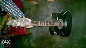 Black And White Cutaway Acoustic Guitar