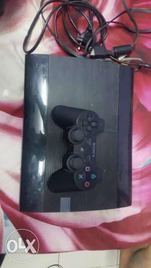 Black Sony PlayStation 3 Game Console With Controllers