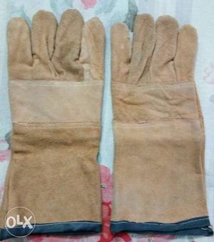 Brand new welding gloves with industrial gloves