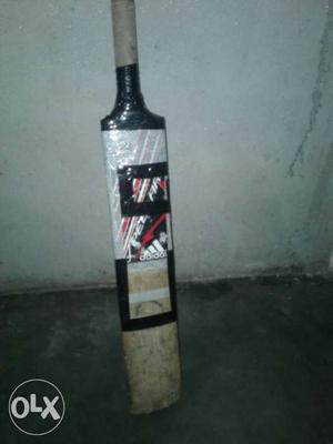 Brown And Black Adidas Cricket Bat