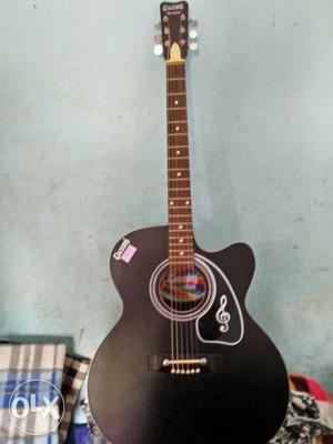 Givson acoustic guitar with elactrical jack to