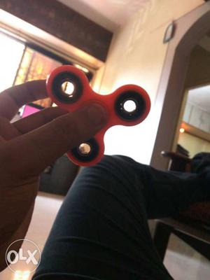 Orange color fidget spinner and amazing stress buster bought