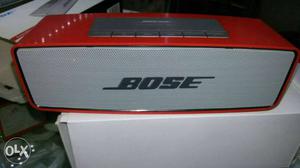 Red And Grey Bose Portable Speaker