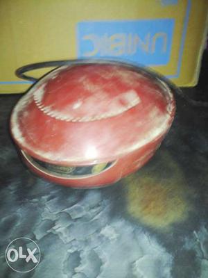 Round Red Electronic Device