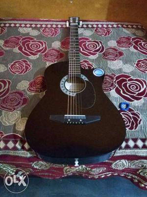 Six string clear sound Acoustic Guitar, with